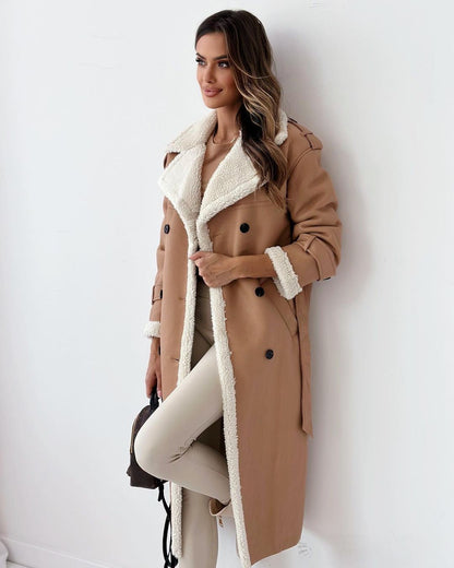 Woman wearing the khaki double-breasted teddy coat with cream shearling collar, front view