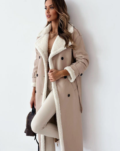 Side view of the khaki double-breasted teddy coat showing the belted waist
