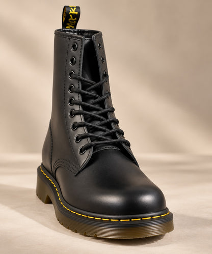 Front view of black vegan leather lace-up boot