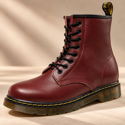 Burgundy unisex lace-up boots studio shot