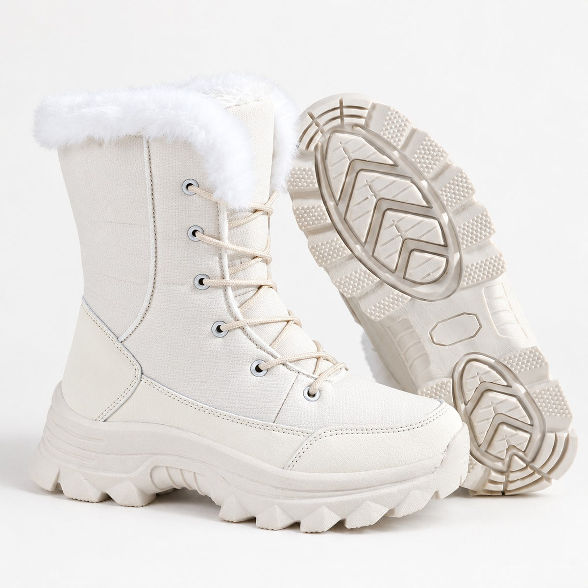 White snow boots side view and non-slip sole