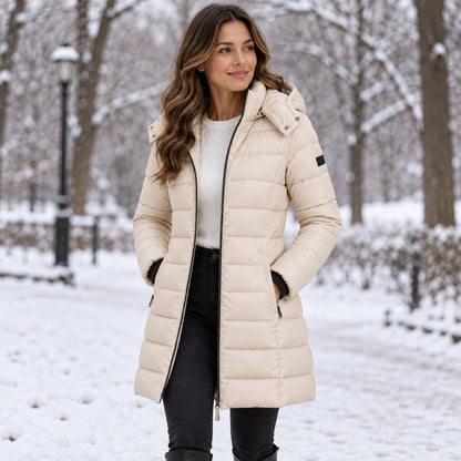 Women's Long Hooded Puffer Coat in Beige — snowy park